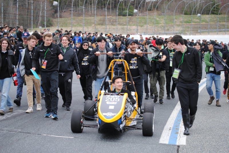 Hereās our team at a racetrack in Michigan with our latest electric car build.